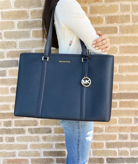 michael kors leather laptop bag.